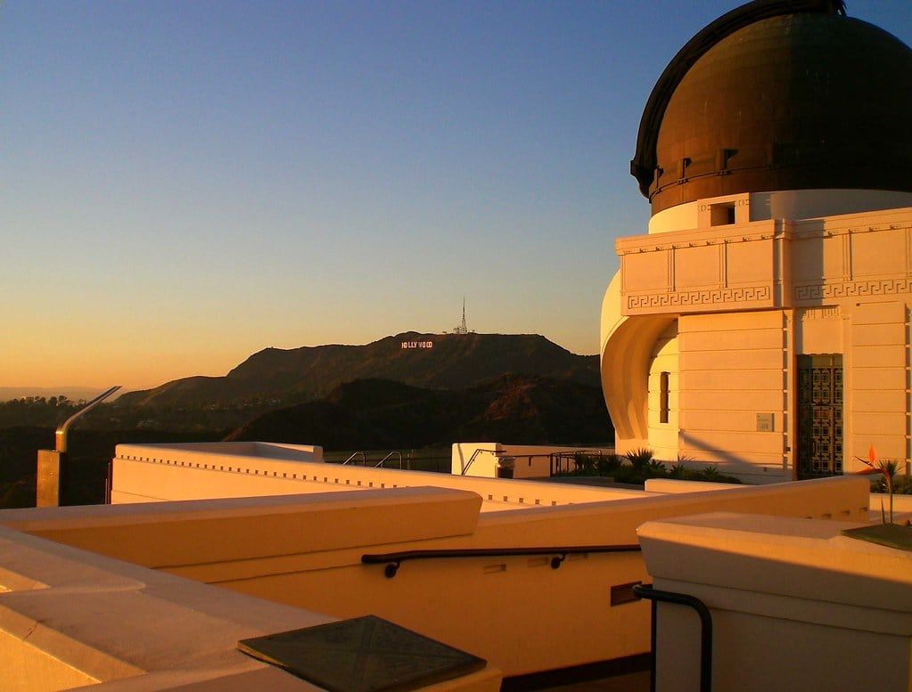 Griffith Observatory and the distant Hollywood sign in warm late-afternoon light